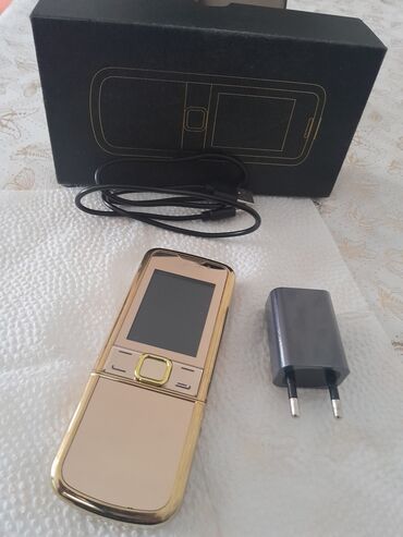 Digər mobil telefonlar: Qızılı korpuslu sürüşdürmə mexanizmalı düyməli mobil telefon — 6