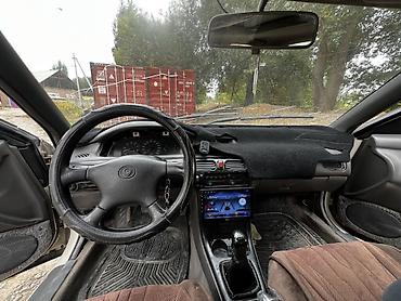 Продажа авто: Mazda 626: 1993 г., 1.8 л, Механика, Бензин, Хэтчбэк — 5