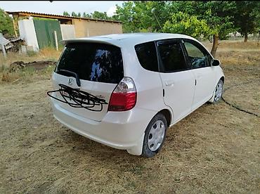 салон машины: Honda Fit: 2002 г., 1.3 л, Автомат, Бензин, Хэтчбэк — 2