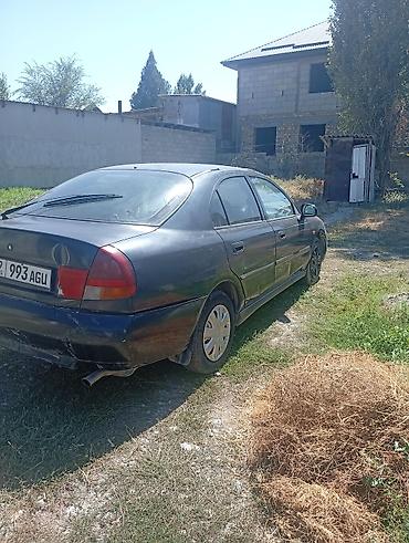 руль windom: Mitsubishi Carisma: 1999 г., Седан — 7
