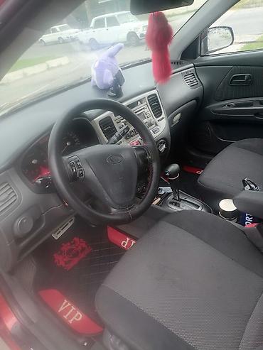 saipa saina lizing: Kia Pride LX sedan – qırmızı rəngdə, avtomatik sürətlər qutusu maşinin — 5