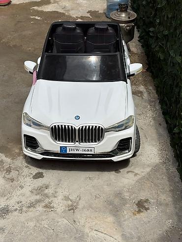 usag masini: Uşaq üçün elektrikli minik avtomobili - Korpus: ağ rəngli, yolsuzluq — 1