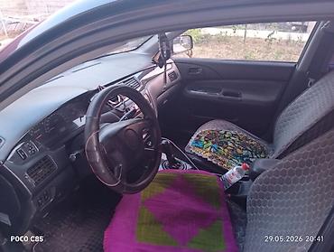 surron light bee: Mitsubishi Lancer: 2004 г., 1.6 л, Механика, Бензин, Универсал — 8