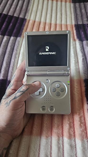 retroid pocket 5: Anbernic RG35XXSP — retro oyunlar üçün nəzərdə tutulmuş portativ (əl — 1