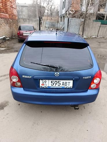 Mazda: Mazda 323: 2002 г., 1.6 л, Механика, Бензин, Хэтчбэк — 4
