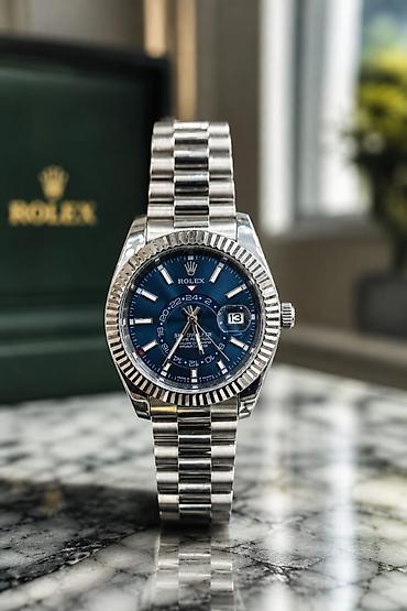 willande saat: Rolex Sky-Dweller kolleksiyası – mavi, yaşıl və açıq mavi siferblat — 1