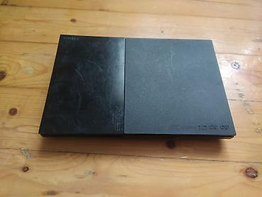 oyun barmaqlığı: Sony PlayStation 2 Slim (SCPH-7xxxx seriyası) Paket məzmunu: - PS2 — 5