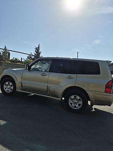 mitsubishi pajero 2000: Mitsubishi Pajero SUV - Korpus: qızılı/bej rəng, 5 qapı, yan — 6