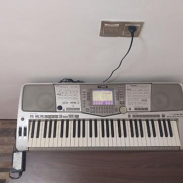 Yamaha PSR-2100 aranjor sintezator - 61 klaviş, toxunuşa həssas