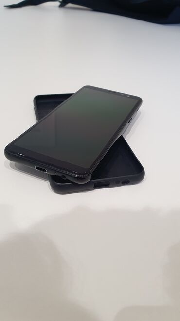 Samsung Galaxy A8, 32 GB, rəng - Qara, Sensor, Barmaq izi, İki sim kartlı