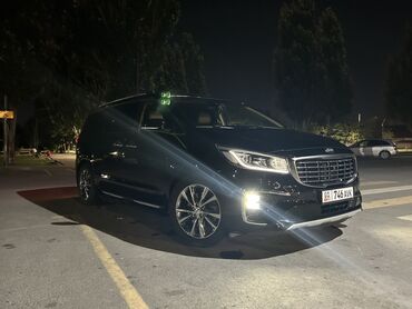 расрочка машина бишкек: Элегантный минивэн Kia Carnival, представленный в черном цвете