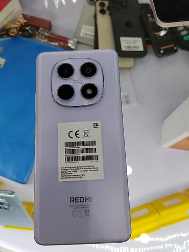 Смартфон Redmi (модель 2312DRA50G), лавандовый цвет. Ключевые