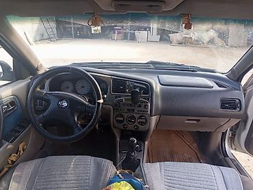 2001: Nissan Primera: 2001 г., Седан — 7