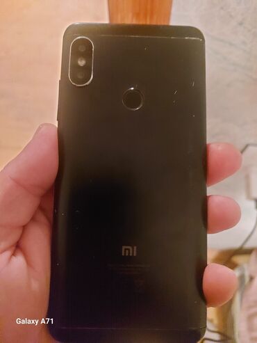 Аудиотехника: Xiaomi Mi 8, 64 ГБ, цвет - Черный, 
 Отпечаток пальца