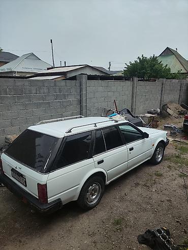 byd e1: Nissan Bluebird: 1988 г., 2 л, Механика, Универсал — 2
