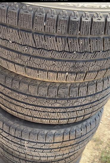 Шины: Зимние шины RoadX 215/50 R17 91H (несколько штук в комплекте) — 1