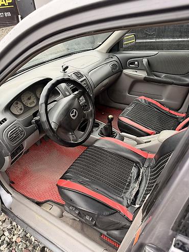 mazda 2000: Mazda 323: 2002 г., 1.6 л, Механика, Бензин, Хэтчбэк — 6