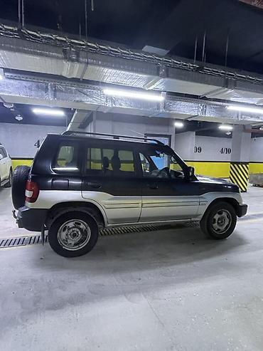 поджеро ио: Mitsubishi Pajero iO: 2001 г., 2 л, Автомат, Бензин, Внедорожник — 7