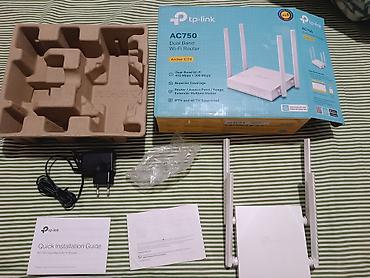 extender: TP-Link Archer C24 AC750 Dual Band Wi‑Fi Router Xüsusiyyətlər: - İki — 1