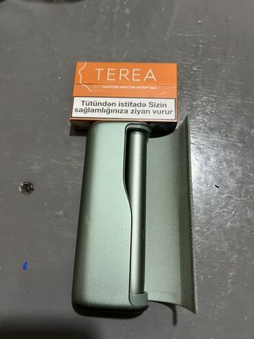 Qəlyan, vayp və aksesuarları: Məhsul: IQOS (elektron tütün qızdırıcı) – yaşıl/mint rəngli cihaz lalafo.az -da Qəlyan, vayp və aksesuarları: Məhsul: IQOS (elektron tütün qızdırıcı) – yaşıl/mint rəngli cihaz