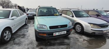 делаем справки: Toyota RAV4: 1996 г., 2 л, Автомат, Бензин, Кроссовер