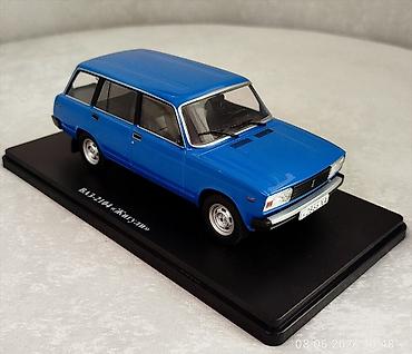 model 1: 2021 il, 1:24 — 5