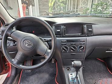 рул: Toyota Corolla: 2006 г., Автомат, Бензин, Хетчбек — 1