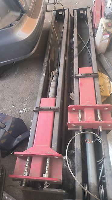 Avtoservis avadanlıqları: Avtoservis üçün iki postlu hidravlik avtomobil qaldırıcı hissələri - — 1
