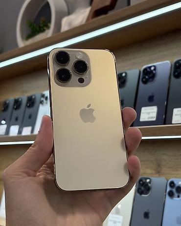 iphone 67: IPhone 14 Pro, 128 GB, Matte Gold, Zəmanət, Simsiz şarj, Face ID — 1