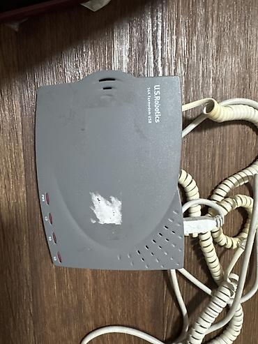 Модемы и сетевое оборудование: U.S. Robotics 56K Faxmodem USB (внешний), модель 5633 - Классический — 1