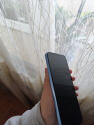 Xiaomi: Xiaomi 12, 256 GB, rəng - Mavi, 
 Barmaq izi, İki sim kartlı, Sensor — 2