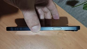mac utu feni: IPhone 14 Plus, 128 GB, Midnight, Simsiz şarj — 2