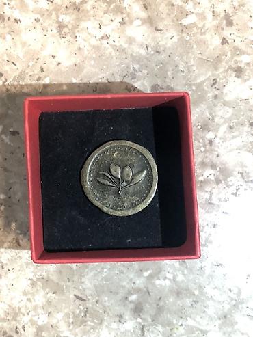 Dekorativ kolleksiya sikkəsi təqdim olunur. Sikkənin bir üzündə qədim