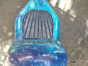 Другой электротранспорт: Гироскутер с ярким корпусом под "космическую" тематику, который — 5