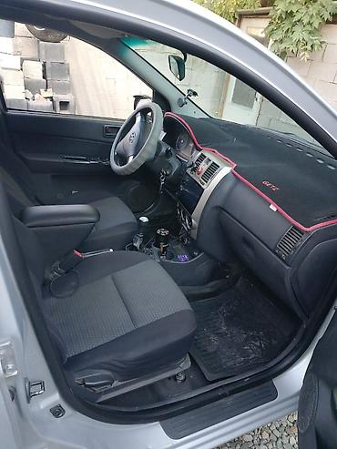 byd e6: Hyundai Getz: 2006 г., Бензин, Хэтчбэк — 7