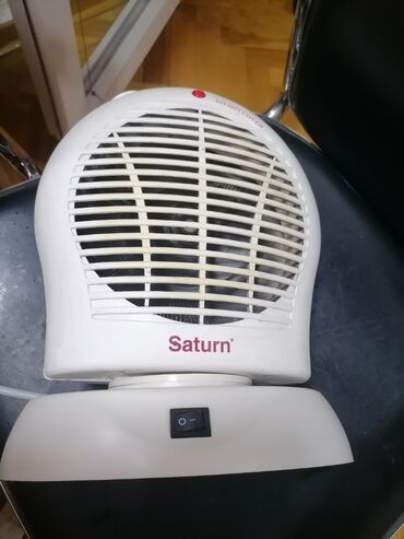 Kaloriferi: Grejalica duvaljka 2 brzine plus ventilator Saturn 2000w Okreće pri — 12