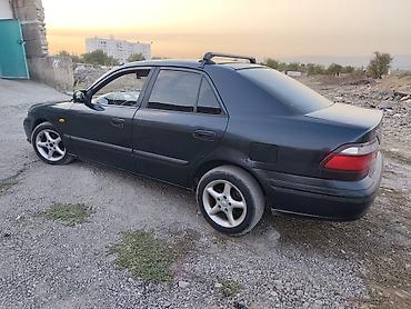 12 t: Mazda 626: 1997 г., 1.8 л, Механика, Бензин, Седан — 4