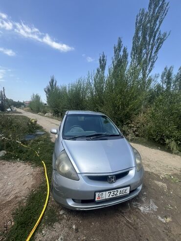 двигатель дэу матиз 0.8 цена новый: Автомобиль Honda Fit серебристого цвета, представленный в кузове