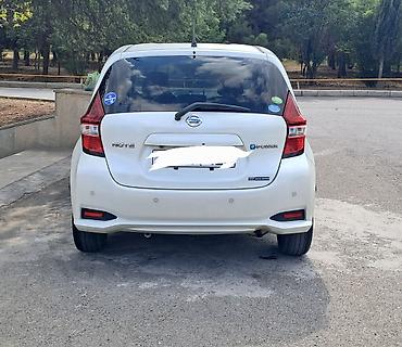 Nissan Note: 1.2 л | 2019 г. Хэтчбэк — 2