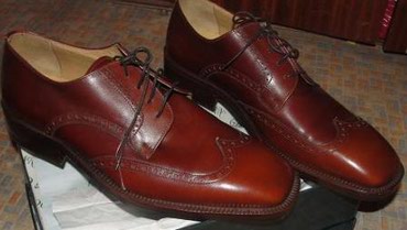 коричневые мужские туфли: Мужские кожаные туфли и босоножки? бренд Onelio Yomo. (производство