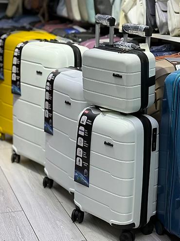Чемоданы: Чемодан, Новый, Большой (более 70 л), Вращающиеся колеса на 360°, Кодовый замок, На колесах — 2
