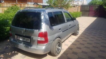Mazda: Mazda Demio: 2002 г., 1.3 л, Механика, Бензин, Седан