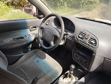 Унаа сатуу: Daewoo Nubira: 1997 г., 1.6 л, Кол менен иштөөчү, Бензин, Седан — 3