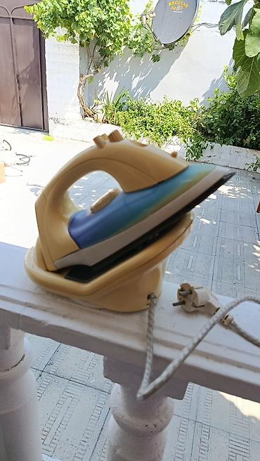 cyber shot: Simsiz/naqilsiz baza ilə buxarlı ütü - Doldurma bazalı (cordless) — 1