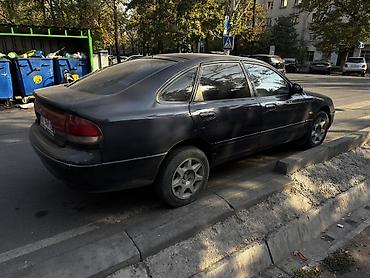 гранат мазда 626: Mazda 626: 1994 г., Механика, Бензин, Седан — 8