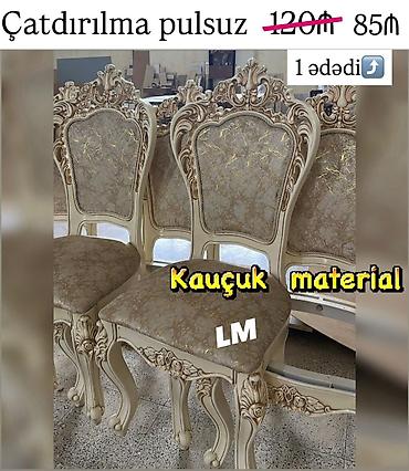 - Klassik üslubda dekorativ oymalarla bəzədilmiş yemək otağı stulu -