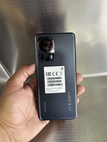 a41 ekran: Xiaomi 13 Lite, 256 GB, rəng - Qara, 
 Düyməli, Barmaq izi, Simsiz şarj