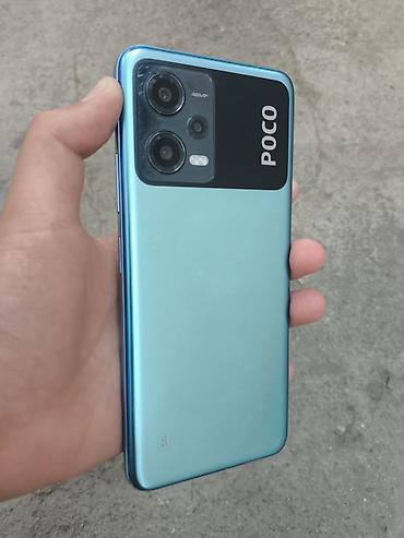 surge android: Poco X5 5G, Б/у, 256 ГБ, цвет - Голубой, 2 SIM — 1