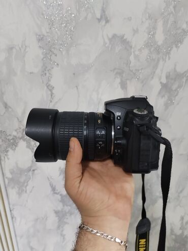 Fotokameralar: Nikon N90 ideal.veziyyetde cox az iwlenib .750m
