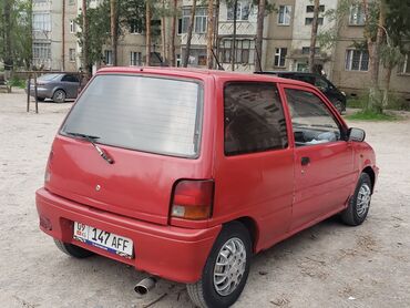 автомобиль daihatsu: Daihatsu Cuore: 1991 г., 0.8 л, Механика, Бензин, Купе
